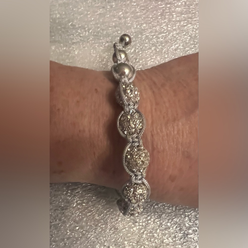 Silver beaded bracelet with drawstring closure